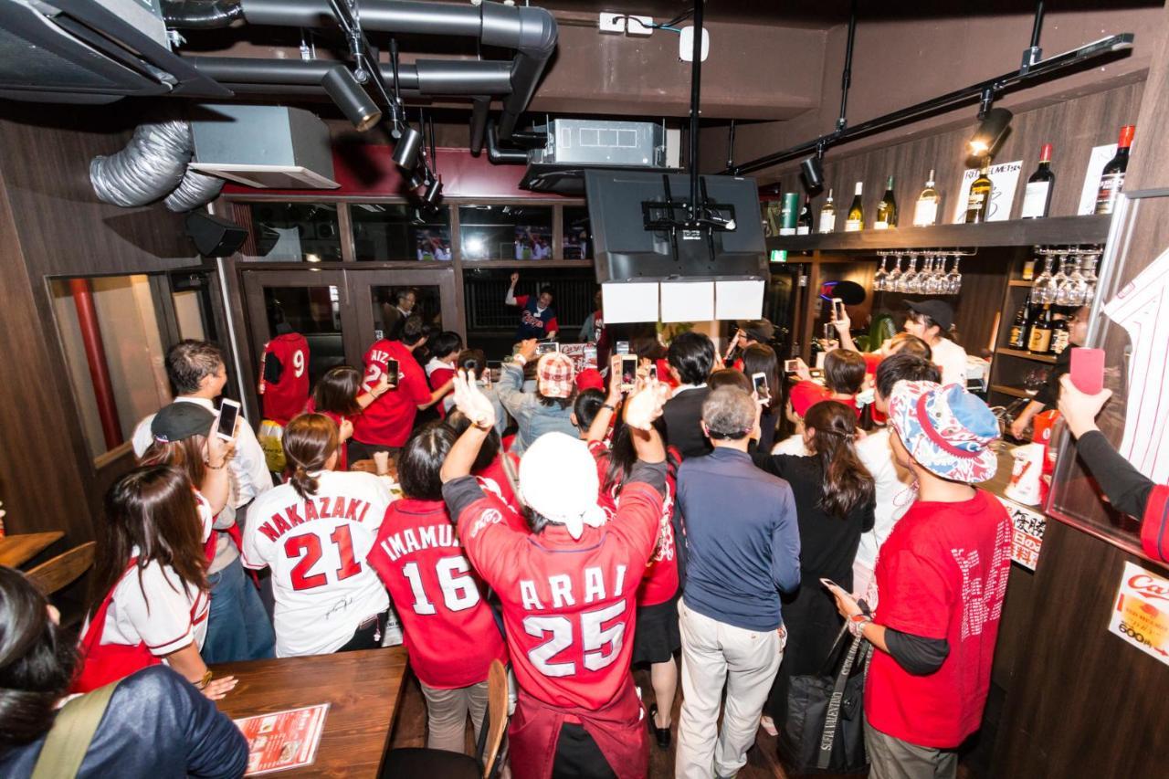 Red Helmet House & Sports Bar Hiroshima Vandrarhem Exteriör bild